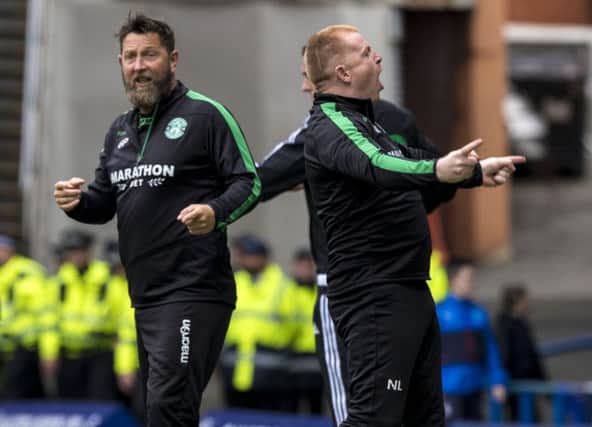 Neil Lennon, right, was criticised by the Rangers supporters' group for his celebrations at Ibrox. Picture: SNS