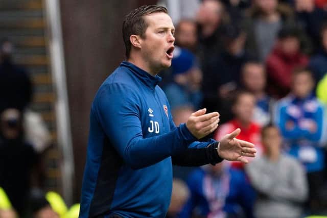 Under-20 coach Jon Daly will stay in charge of Hearts for this weekend's match with Motherwell