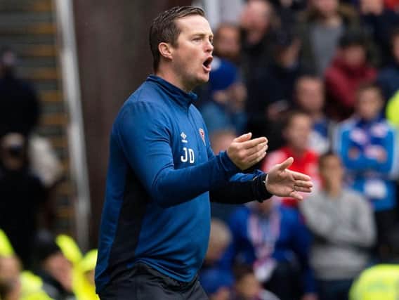 Under-20 coach Jon Daly will stay in charge of Hearts for this weekend's match with Motherwell