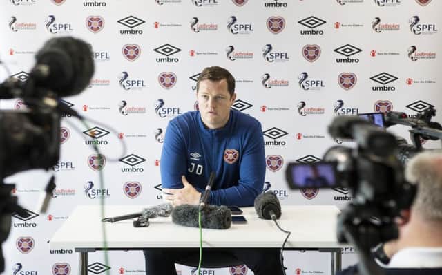 Hearts interim head coach Jon Daly speaks to the media. Picture: SNS