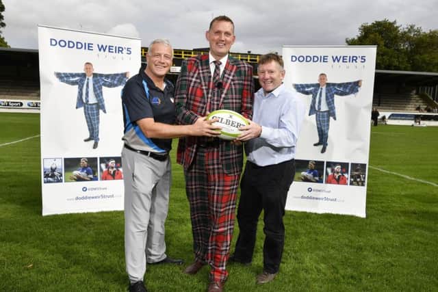 Former Scotland international Doddie Weir (centre) is pictured with Scott Hastings (left) and Gary Armstrong as he launches the trust.