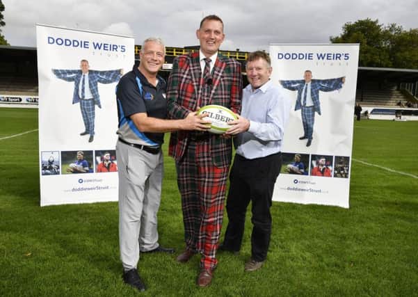Former Scotland international Doddie Weir (centre) is pictured with Scott Hastings (left) and Gary Armstrong as he launches the trust.