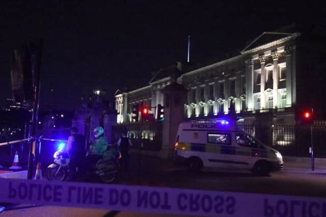 A police cordon outside Buckingham Palace as a second man has been arrested on suspicion of terrorism offences Picture; PA