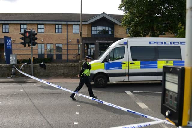 Police on Ferry Road after a 10-year-old boy was seriously injured in a hit and run incident. Picture: SWNS