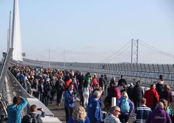 Competition-winners on the Queensferry Crossing, for a one-off opportunity to walk across the new bridge.Picture; PA