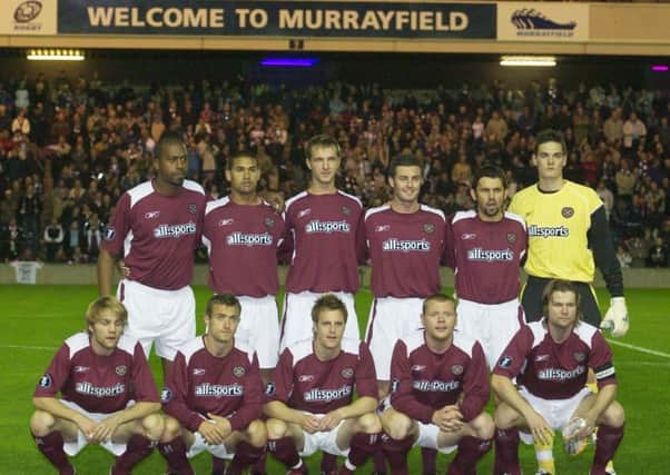 Hearts line up for the clubs first ever game at Murrayfield. Scorers Patrick Kisnorbo (second left back row) Andy Webster (third left back row) and Paul Hartley) back row second right)