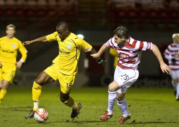 Akpo Sodje in action for Hibs against Hamilton at New Douglas Park. Picture: Ian Georgeson