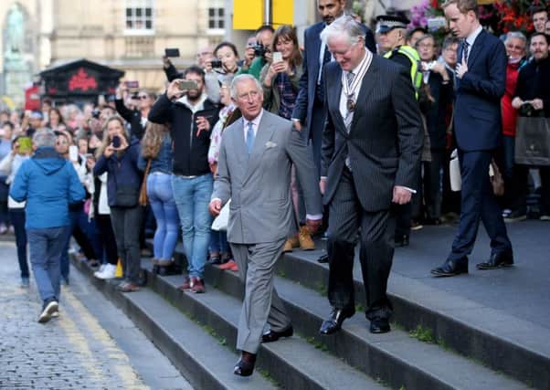 The Prince of Wales on the Royal Mile after a visit to the Patrick Geddes Centre at Riddle's Court. Picture: Jane Barlow/PA Wire