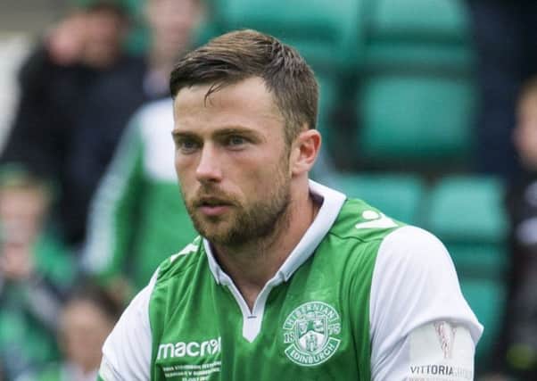 Lewis Stevenson has been left on the bench in Hibs' past two matches. Pic: TSPL