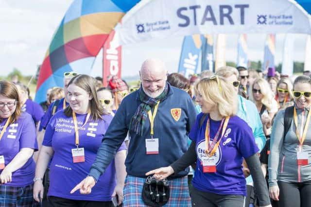Start of the Wee Wander at Gypsy Brae Lead out by Sir Tom Hunter and Hazel Irvine.