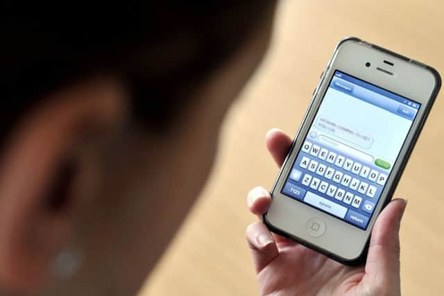 Phone ownership could increase the likelihood of bullying. Picture; Michael Gillen