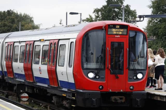 Commuters are seen on the platform at Parsons Green station in London, Monday. Picture; AP