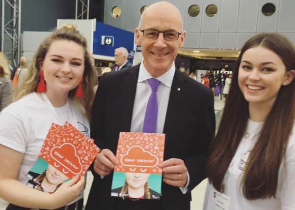 Niamh Curran, left, and Holly McNie told Deputy First Minister John Swinney about their work