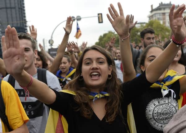 Students shout slogans during a pro-referendum demonstration in Barcelona. Picture: Getty