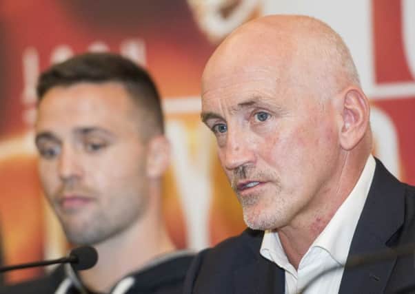 Barry McGuigan, right, and his fighter Josh Taylor in the background. Pic: Ian Georgeson