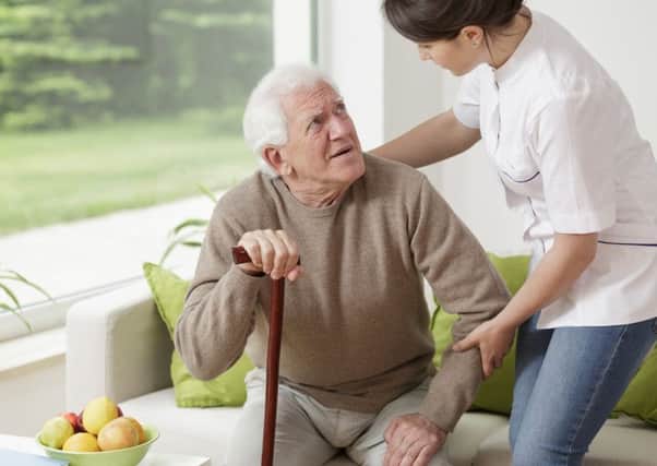 An elderly man receives care at home. Picture: istockphoto
