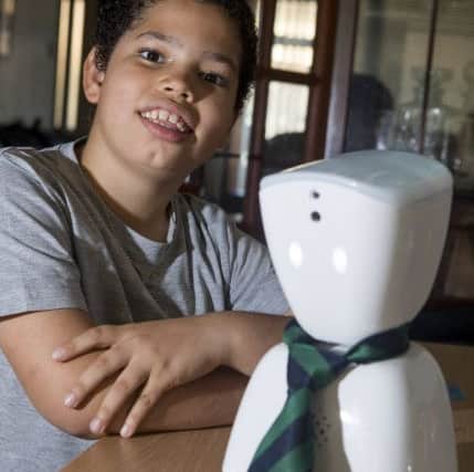 Ten-year-old Keir Wallace, from Edinburgh who suffers from a rare disease and is often unable to attend school will send a robot to classes instead. Picture; SWNS