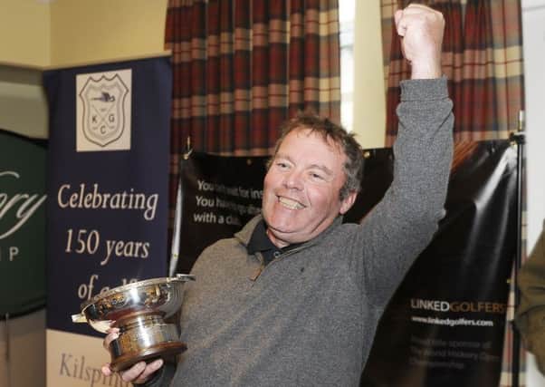 Fraser Mann celebrates becoming the World Hickory Open champion at Kilspindie. Pic: Neil Hanna