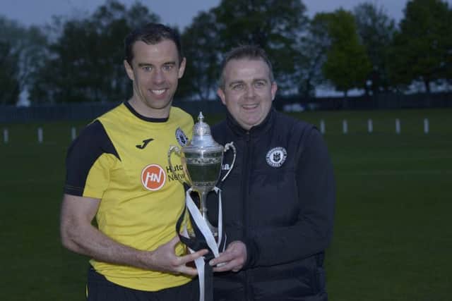 Former Edinburgh City captain Dougie Gair, left, with Jardine celebrate the club's historic promotion to League Two in May 2016. Picture: Andy O'Brien