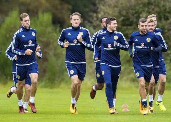 Christophe Berra, second left main picture, is relishing tonights crucial World Cup qualifier with Slovakia