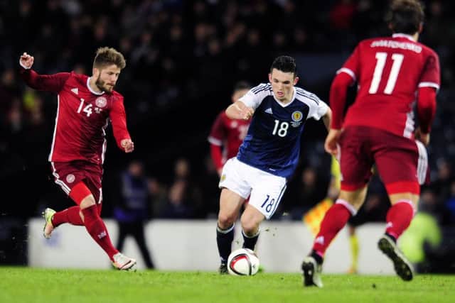 McGinn shone on his Scotland debut, winning the man-of-the-match award against Denmark. Picture: Michael Gillen