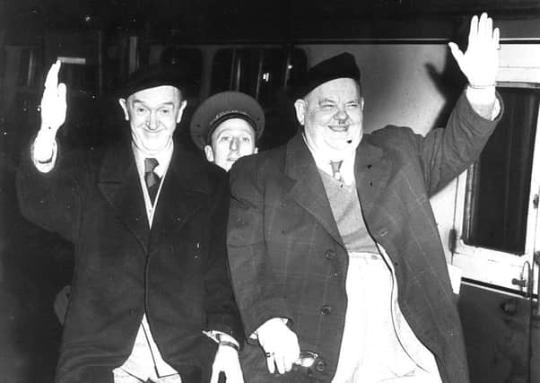Laurel and Hardy  at the Caledonian railway station in Edinburgh in 1954