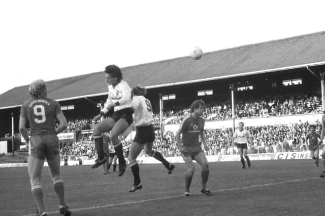 Hearts Craig Levein and Hibs Willie Irvine attack the Bayern goal at Tynecastle in 1985
