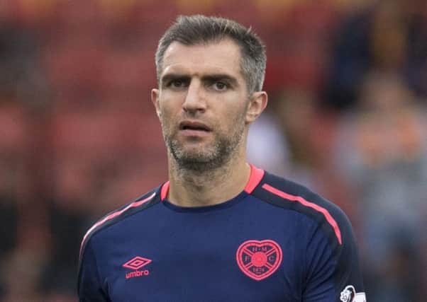 Aaron Hughes is suffering a calf injury