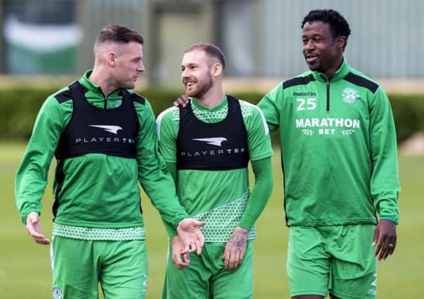Hibs players Martin Boyle, centre, Anthony Stokes and Efe Ambrose face a tough test against Aberdeen on Saturday