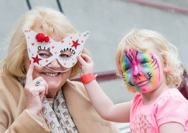 Ann Budge with Lilly-Heather at the Big Hearts family fun day at Tynecastle