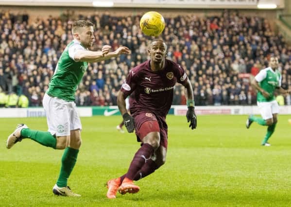 Lewis Stevenson and Arnaud Djoum vie for the ball during the last meeting between the two sides at Easter Road. Picture: Ian Georgeson