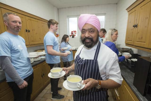 Tony Singh's recipes will be handed out at local food banks. Picture: Peter Devlin