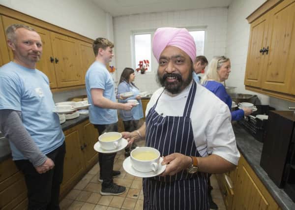 Tony Singh's recipes will be handed out at local food banks. Picture: Peter Devlin