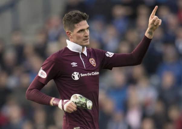 Kyle Lafferty celebrates scoring the only goal of the game