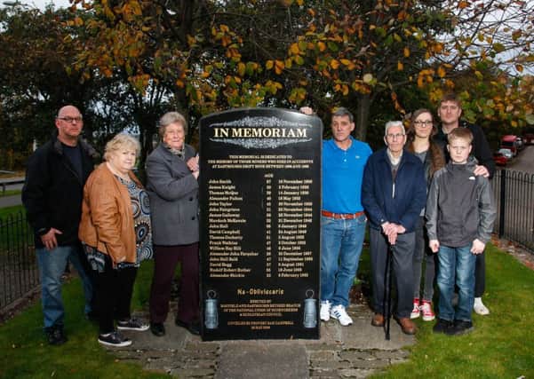 Relatives of miners who lost their lives in Easthouses Drift Mine and whose names are listed on the local memorial. Alan Greig (far left) is proposing that new streets are named after the miners that lost their lives.
