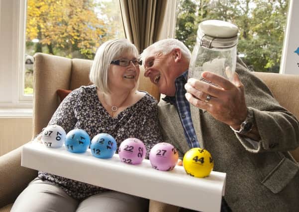 Lottery winners Tommy and LInda Parker celebrate their win. Picture: Al Linford