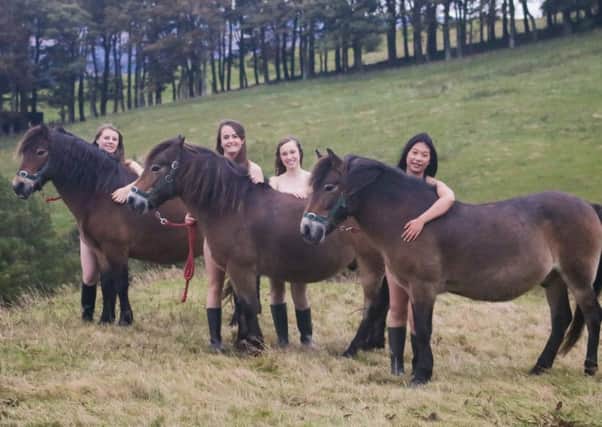 Members of the Edinburgh University Exmoor Pony Trekking Society with their ponies, pictured in the Pentland Hills.