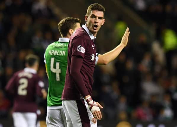 Hearts striker Kyle Lafferty can't hide his frustration. Pic: SNS