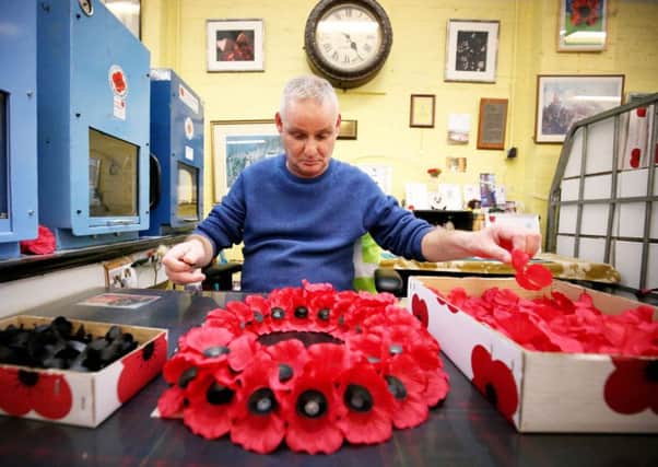 Veteran Colin Richard makes poppy wreaths as final preparations are made ahead of this year's PoppyScotland Appeal and Remembrance Day at the Lady Haig's Poppy Factory in Edinburgh. PRESS ASSOCIATION Photo. Picture date: Tuesday October 24, 2017. The factory makes over five million poppies and 10,000 wreaths all hand assembled by the veterans who work at the factory founded in 1926 by Lady Haig, the wife of Field Marshal Haig. Photo credit should read: Jane Barlow/PA Wire