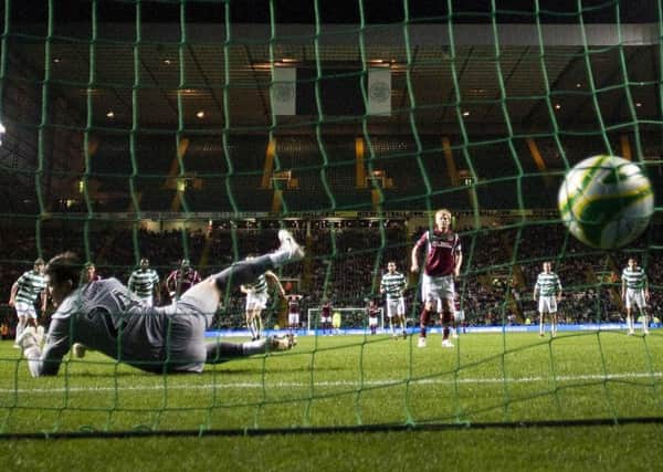Michael Stewart, previously booed by some so-called supporters, sends Celtic goalkeeper Lukasz Zaluska the wrong way