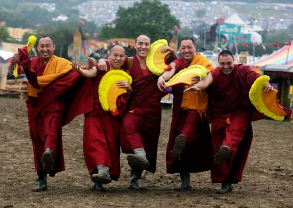 The Gyuto Monks of Tibet pose at Glastonbury Festival