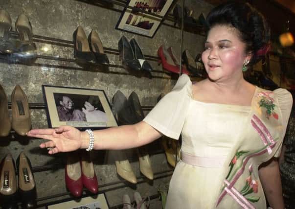 Merry me may love buying loads of footwear online  but just dont call me Imelda Marcos! Picture: AP