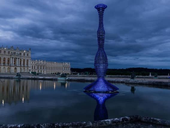 Joanna Vasconcelos previously created sculptures of blue champagne bottles for the Palace of Versailles in France.