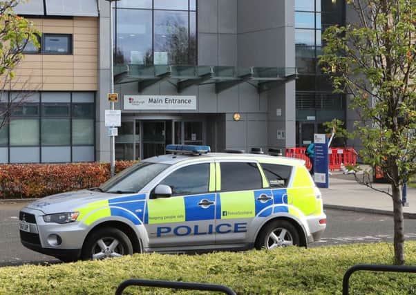 A police vehicle outside the main entrance to Edinburgh College's campus in Granton where a police officer suffered non life-threatening injuries after being stabbed in the back. Picture; Jane Barlow PA