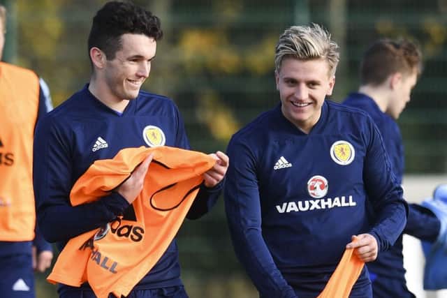 Ex-Hibs team-mates John McGinn, left, and Jason Cummings prepare for Scotland's clash with the Netherlands on Thursday. Pic: SNS