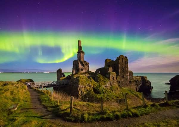 Amazing northern lights display over Sinclair & Girnigoe Castle in Caithness, Scotland. Picture: SWNS