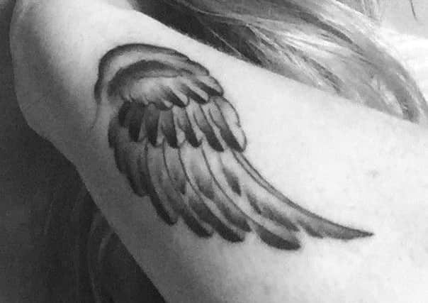 Hayley Matthews' angel-wing tattoo