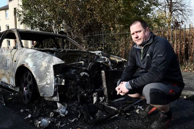 Alistair Clark's Audi was set alight during the carnage in North Edinburgh on Bonfire Night. Picture: Lisa Ferguson
