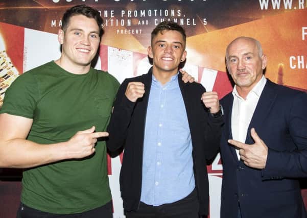 Shane McGuigan, left, and Barry McGuigan, right, are tipping their boxer, Jason Easton, to win