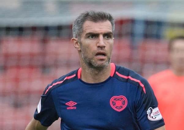 Aaron Hughes has been named in Northern Ireland's starting XI against Switzerland. Pic: TSPL